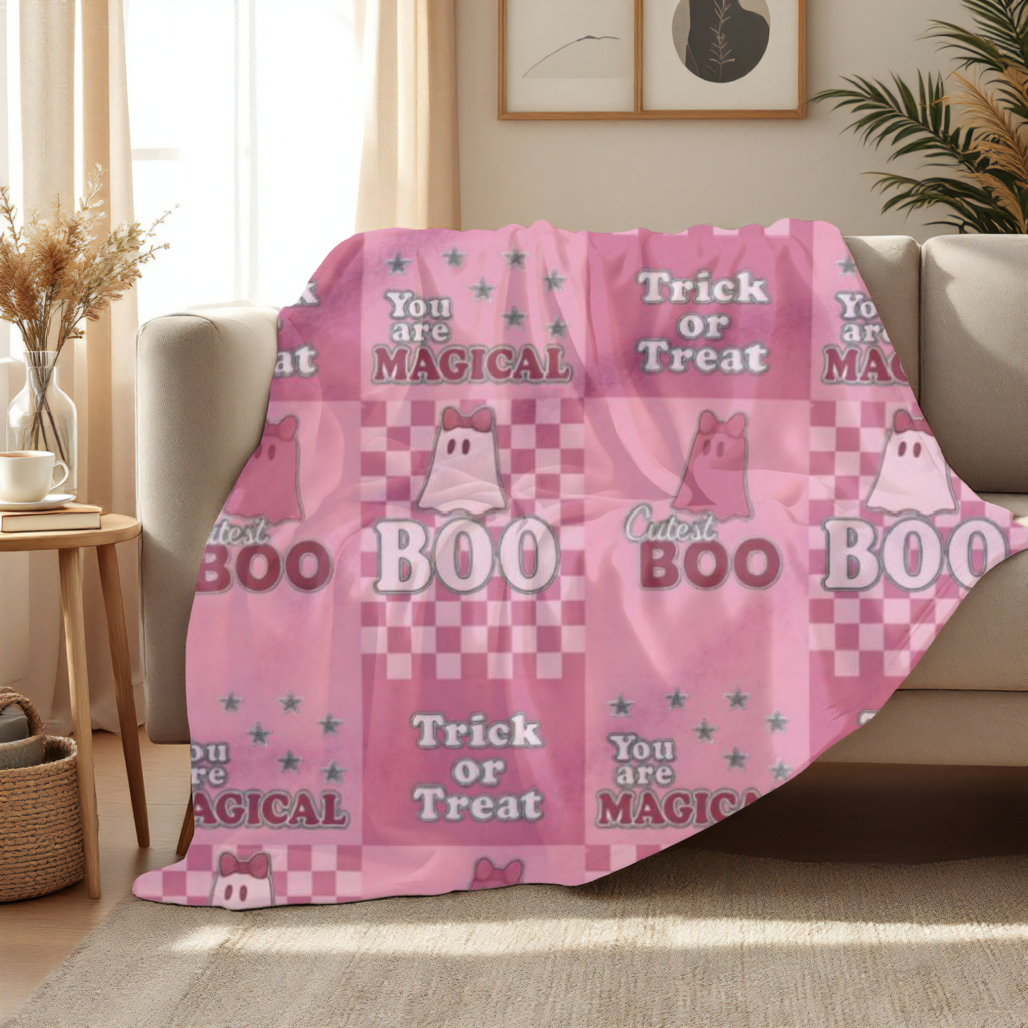 Cutest Boo Pink Ghost Blanket, This soft and fluffy throw features charming ghosties dancing across a playful pink canvas, making it the perfect snuggle blanket for cozy nights in.