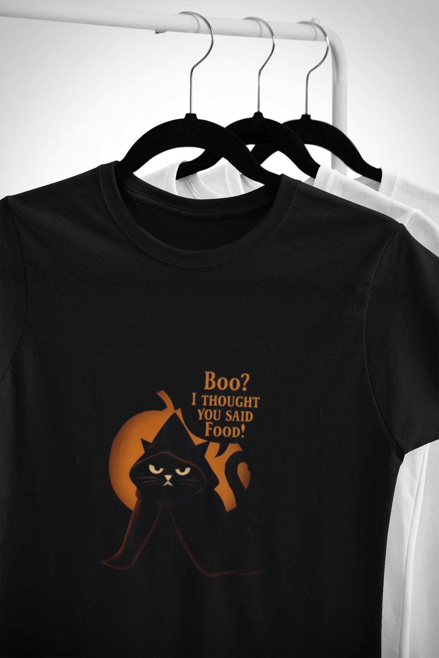 Boo? I Thought U Said Food Halloween T-Shirt, The funny fat cat illustration captures the heart of all who adore their feline friends, especially those who can't resist a chuckle over cat food antics.