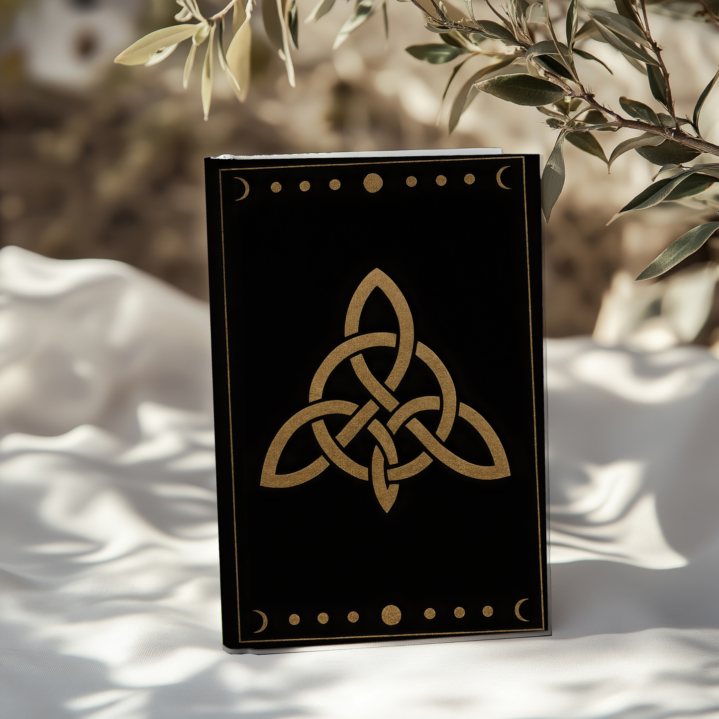 Witches Knot Hardback Notebook, This enchanting witch journal, adorned with intricate wiccan symbols, serves as the perfect book of shadows for all levels of practitioners.