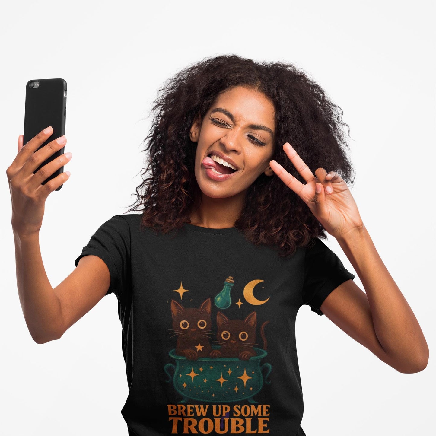 Brew Up Some Trouble Cat Witchy T-shirt, The seamless blend of mystical charm and humor makes this shirt a must-have for any lover of cute Halloween cat apparel.