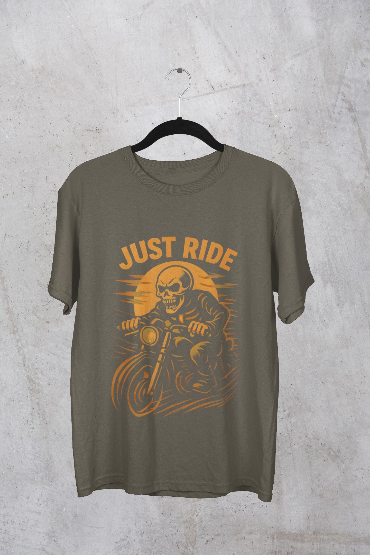 Just Ride Skull Motorcycle T-Shirt, Featuring a striking skull graphic tee design, it captures the essence of the open road, making it a perfect ghost rider shirt for enthusiasts.