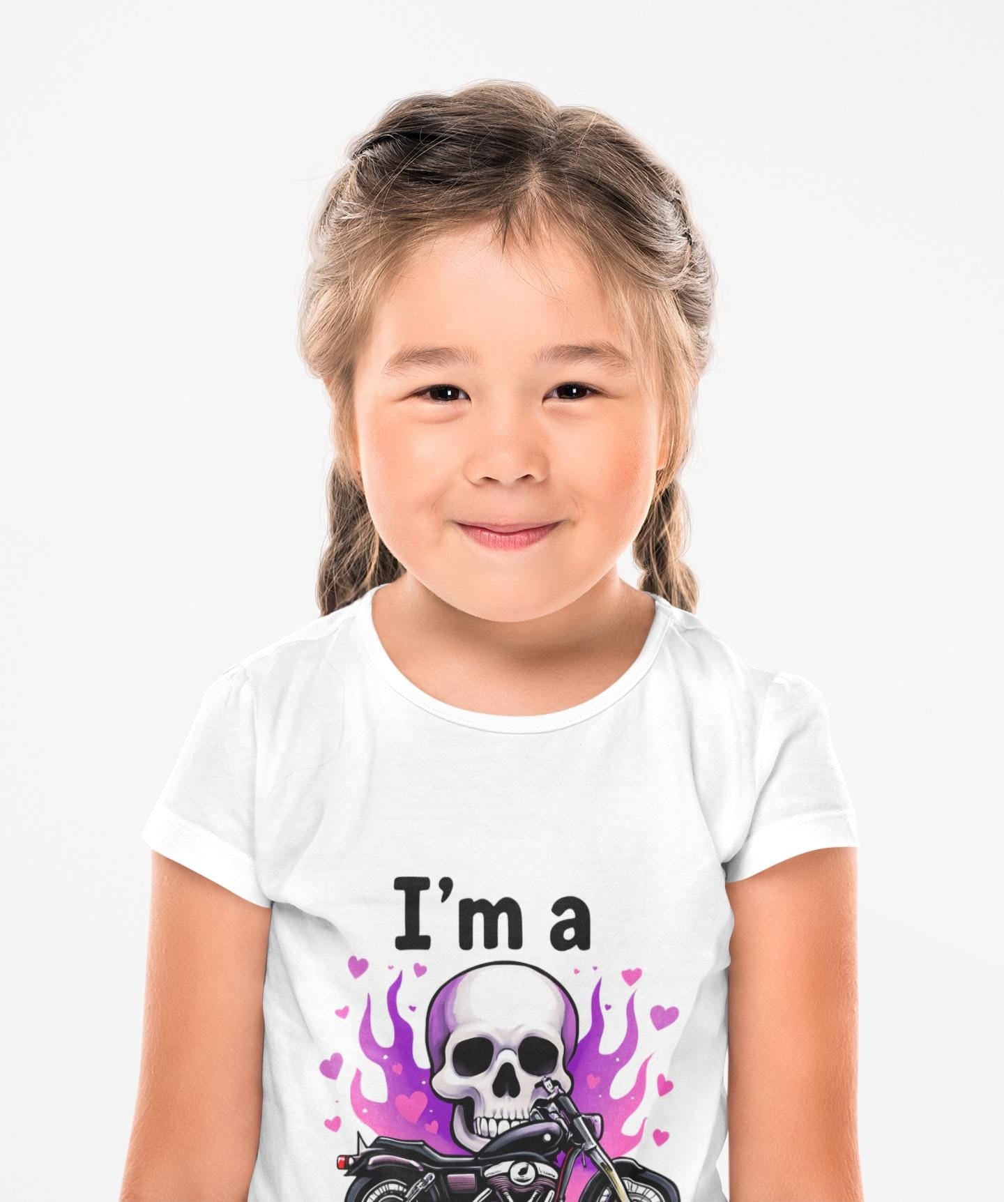 Kids Motorbike Tee I'm a Biker Kid T-shirt, Whether they're dreaming of dirt trails or asphalt adventures, this kids bike shirt is the ultimate motorcycle tee for your little daredevil.