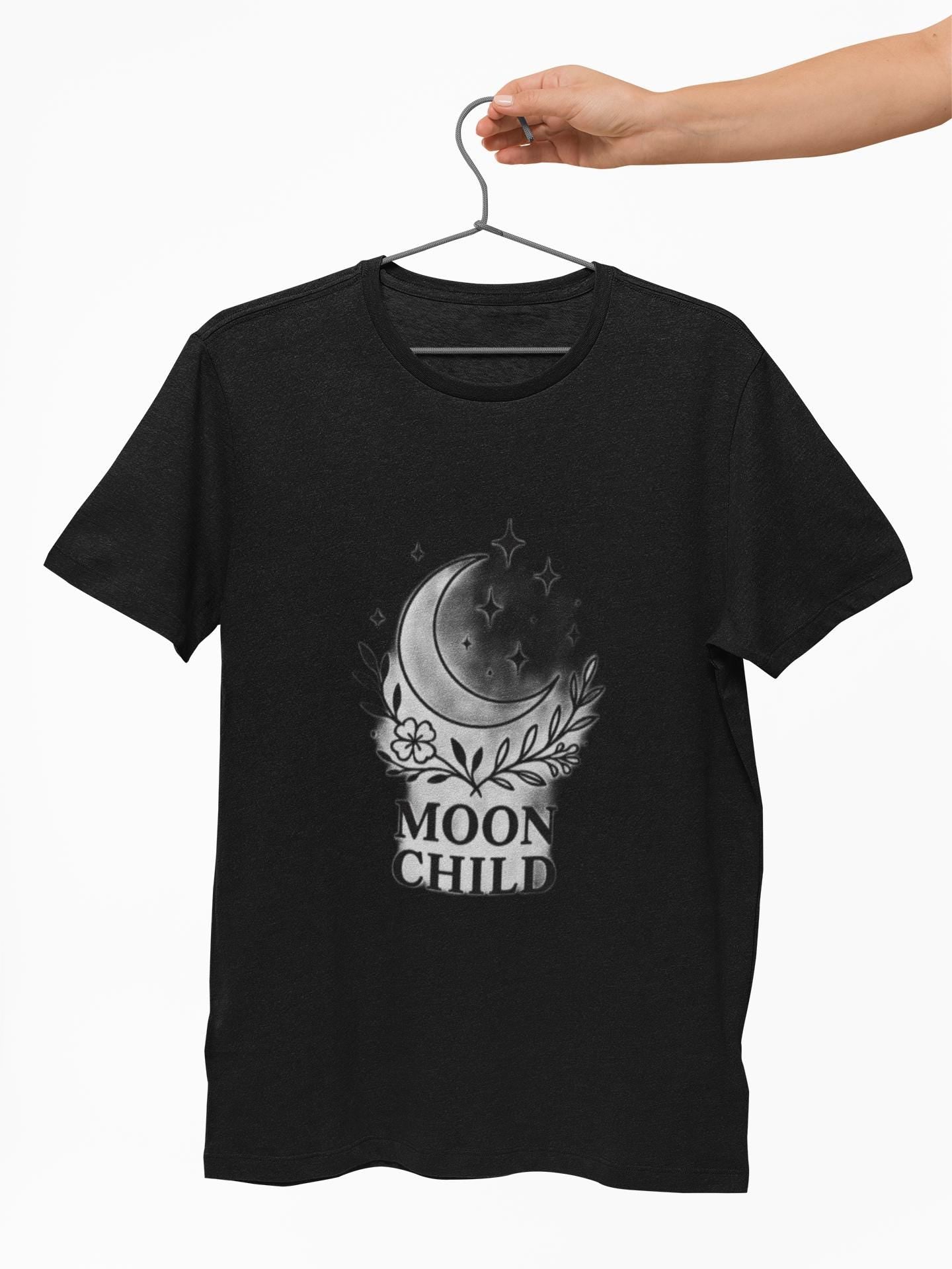 Moon Child T-Shirt, Crescent Moon Shirt, this moon child tee is more than just a piece of pagan clothing—it's a magical shirt that invites the wearer to explore the enchanting world of witchy things.