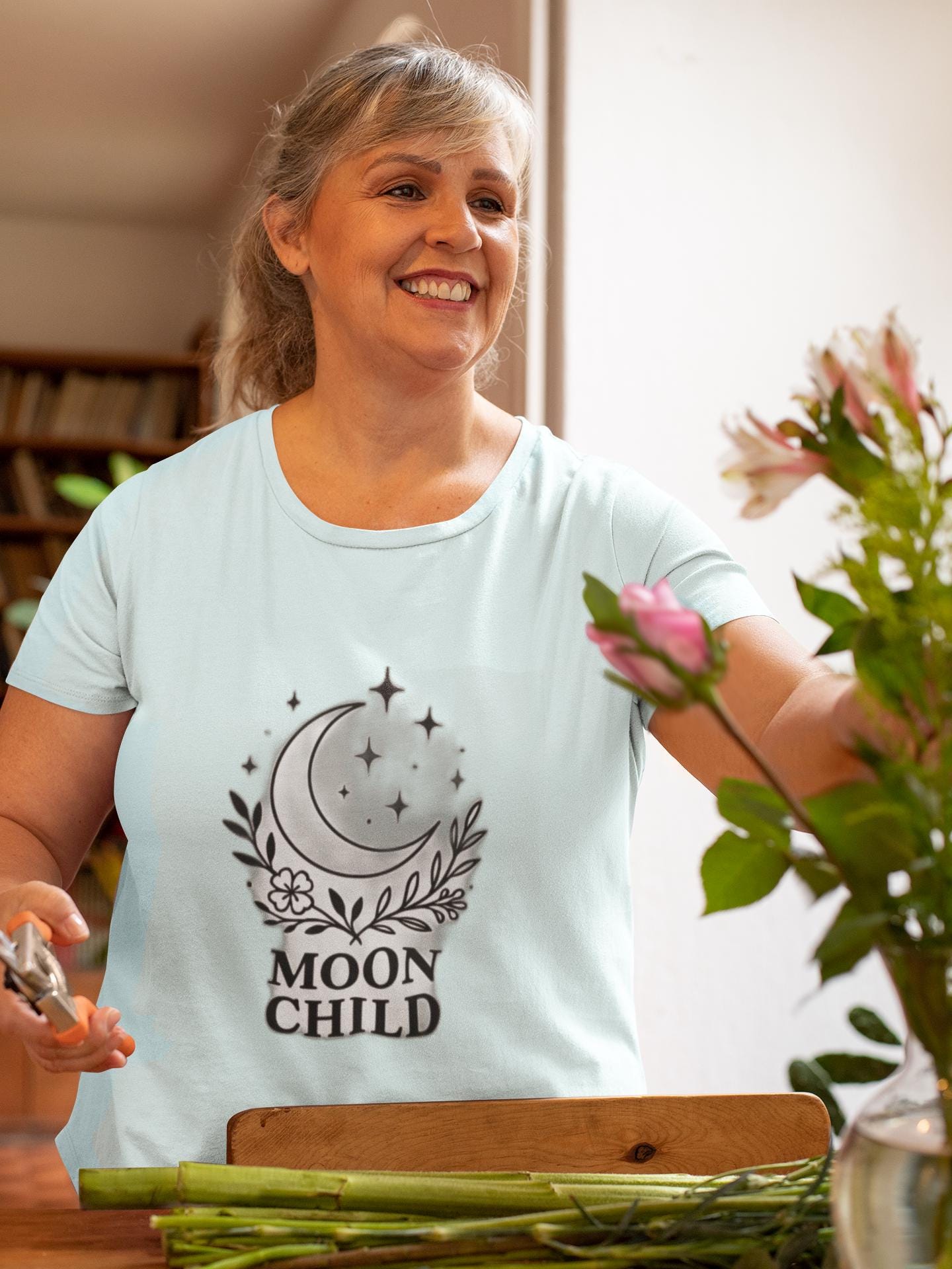 Moon Child T-Shirt, Crescent Moon Shirt, this moon child tee is more than just a piece of pagan clothing—it's a magical shirt that invites the wearer to explore the enchanting world of witchy things.