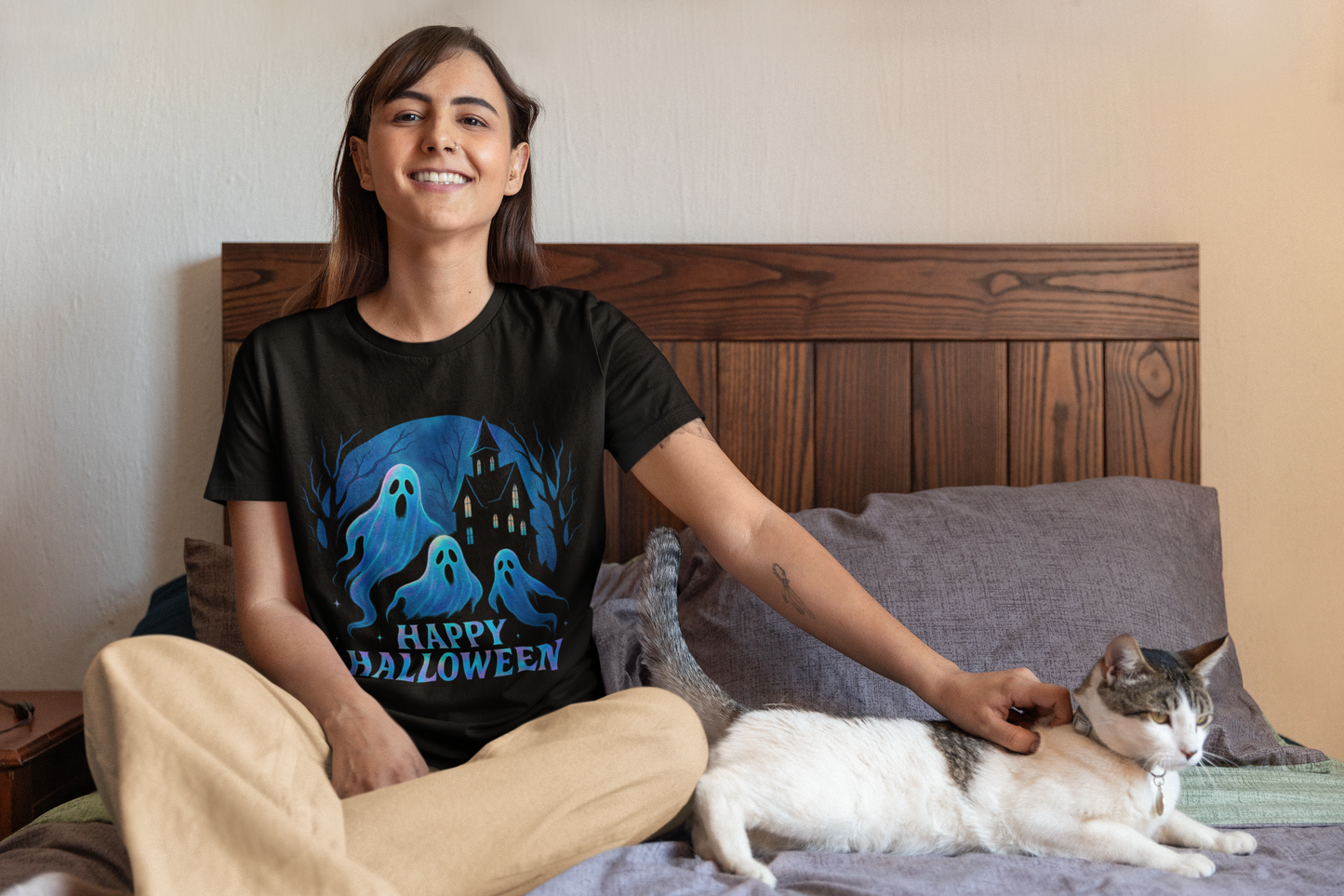 Happy Halloween Holographic Ghost Tshirt,this ghostie-themed top is both a haunted shirt and a whimsical addition for any fan of ghostly fun.