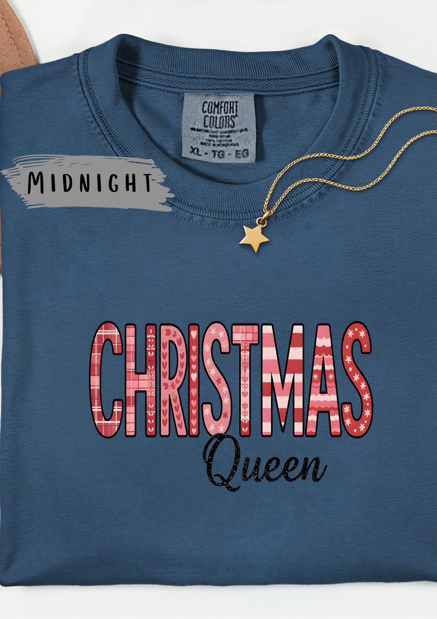 Christmas Queen Pinkmas T-shirt,this pink Christmas tee offers unparalleled comfort, making it a fabulous holiday graphic tee for all your festive activities.