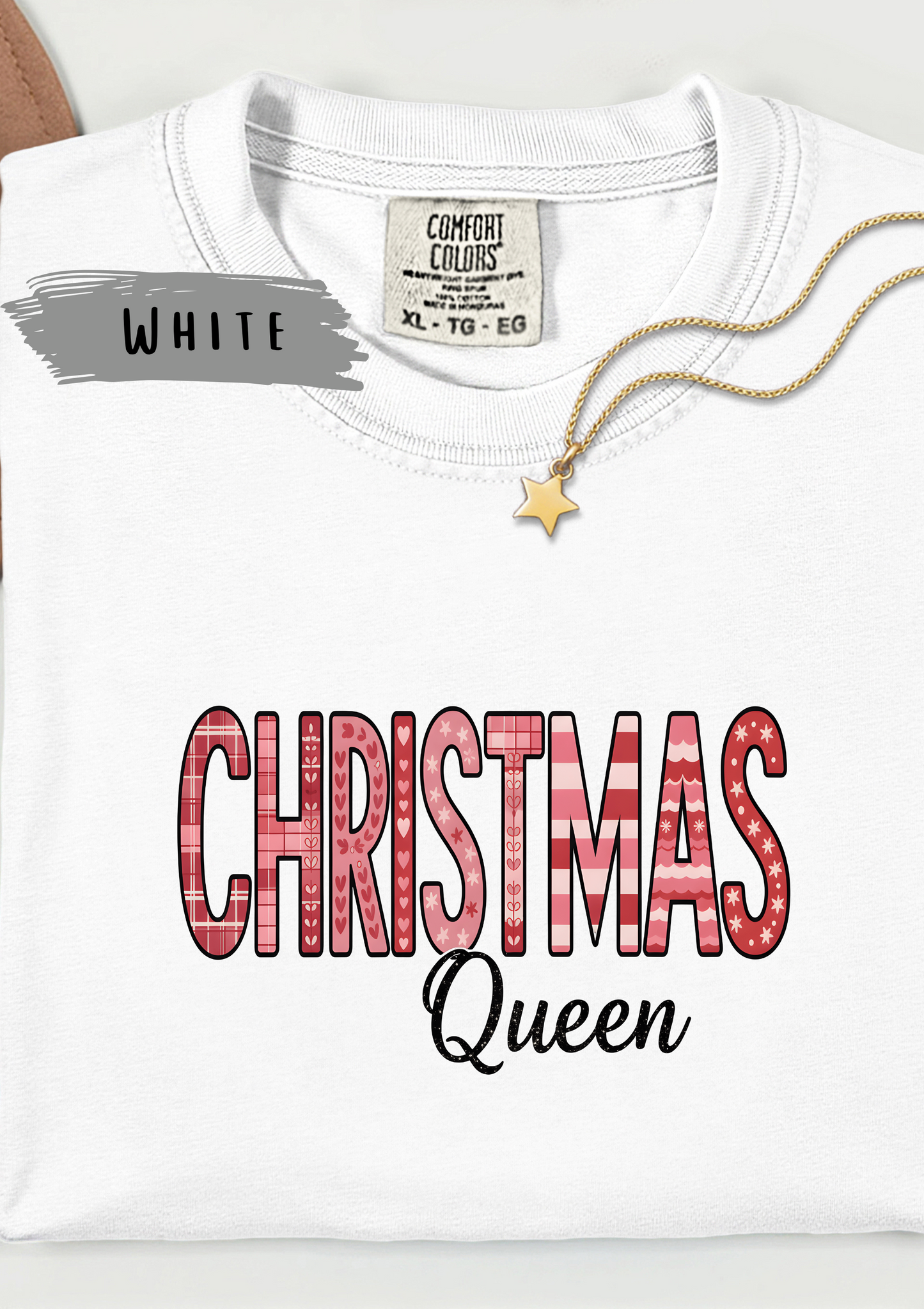 Christmas Queen Pinkmas T-shirt,this pink Christmas tee offers unparalleled comfort, making it a fabulous holiday graphic tee for all your festive activities.