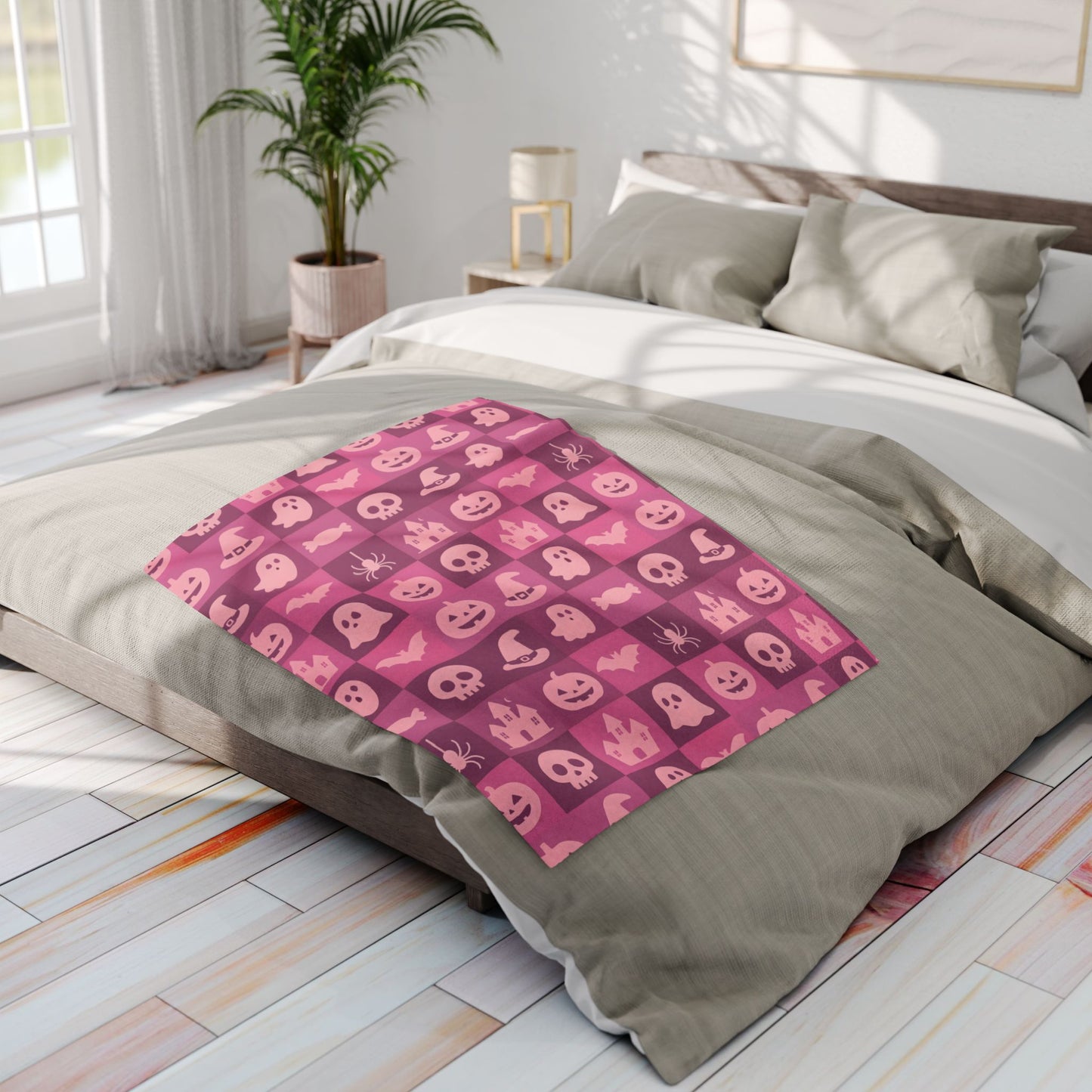 Spooky Pink Halloween Blanket, perfect for adding a unique twist to your seasonal decor. Drape this plush pink ghost blanket over your sofa to invite a cozy, festive warmth