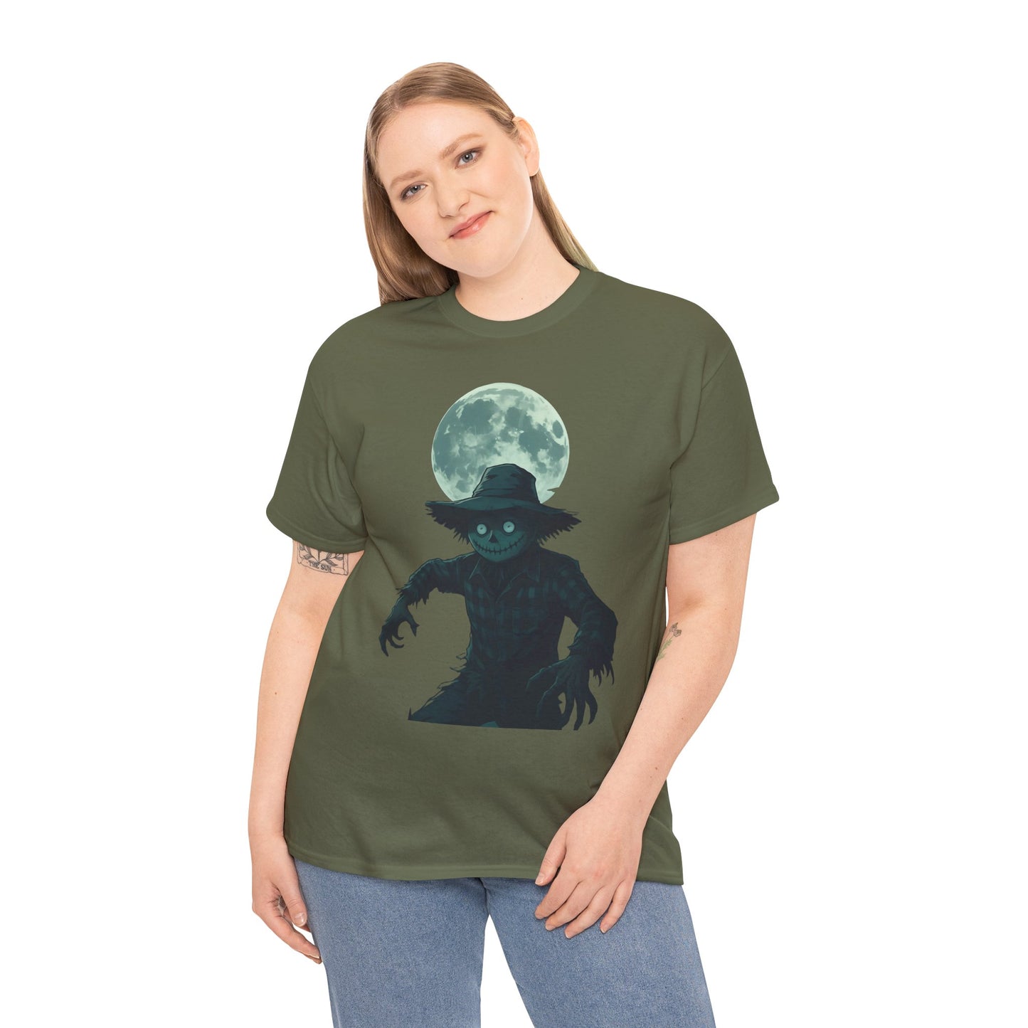 Halloween Scarecrow T-Shirt, This scarecrow shirt captures the essence of the season, transforming the traditional harvest icon into a pumpkin scarecrow that’s both captivating and chilling.Halloween