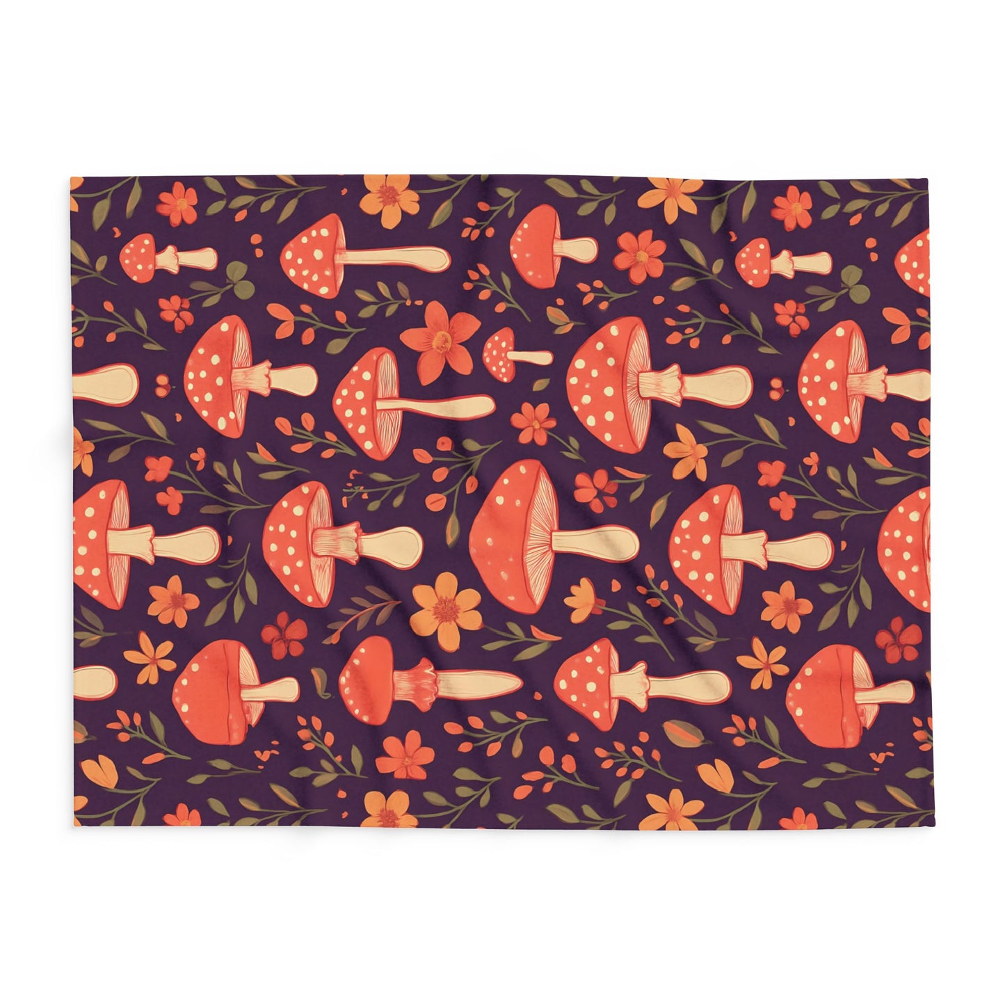 Cozy Mushroom Blanket, The enchanting mushroom pattern, set against a rich plum throw, turns any sofa into an autumnal paradise.