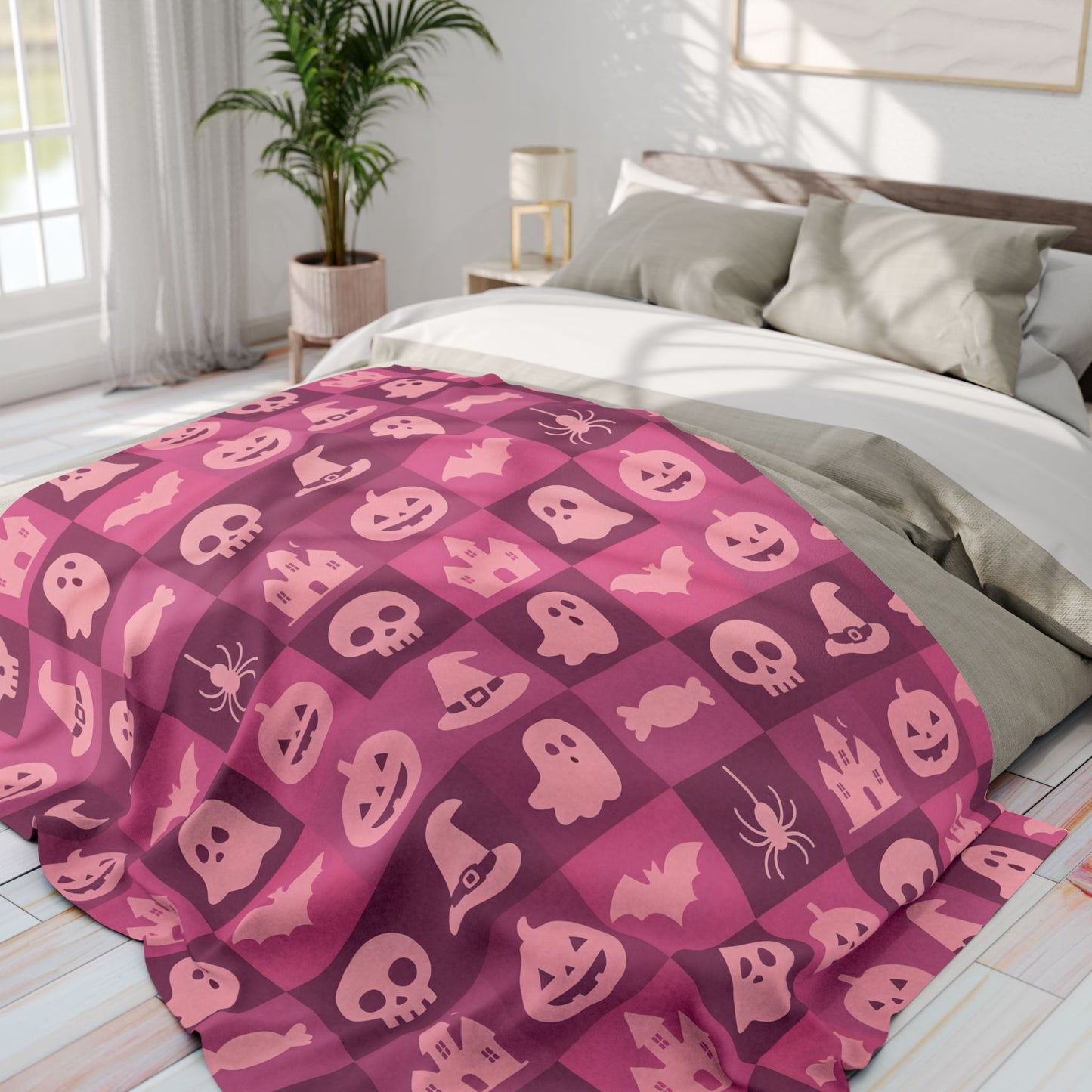 Spooky Pink Halloween Blanket, perfect for adding a unique twist to your seasonal decor. Drape this plush pink ghost blanket over your sofa to invite a cozy, festive warmth