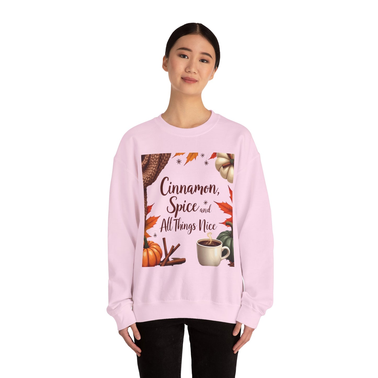 Cinnamon Spice and All Things Nice Sweatshirt, promises to keep you snug while adding a touch of seasonal charm to your wardrobe. Whether you’re sipping on a pumpkin latte or taking a leisurely stroll through fallen leaves,