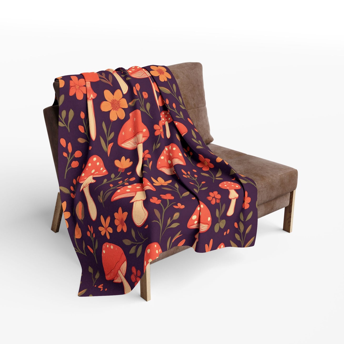Cozy Mushroom Blanket, The enchanting mushroom pattern, set against a rich plum throw, turns any sofa into an autumnal paradise.