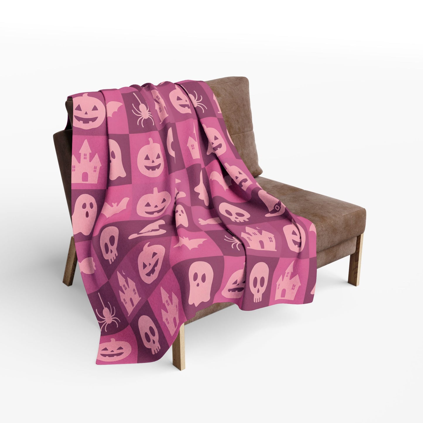 Spooky Pink Halloween Blanket, perfect for adding a unique twist to your seasonal decor. Drape this plush pink ghost blanket over your sofa to invite a cozy, festive warmth