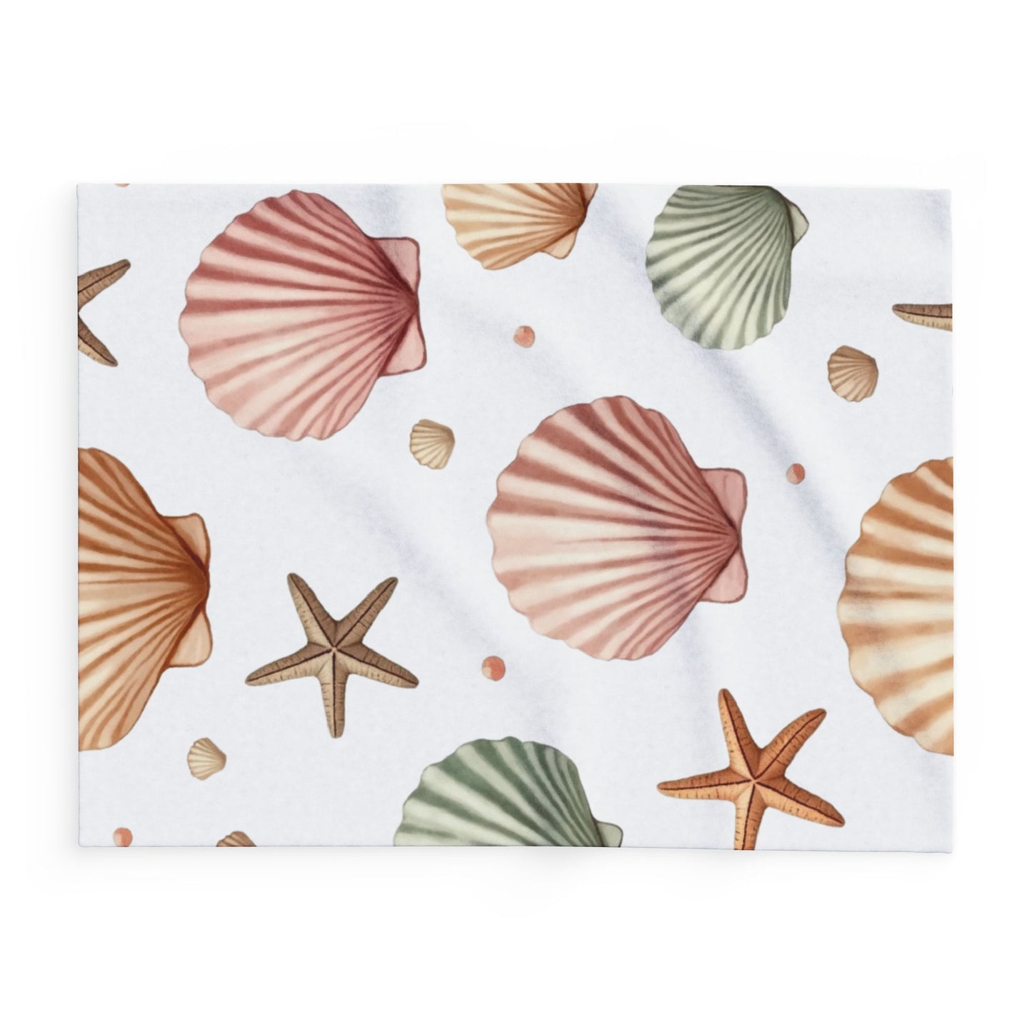 Cozy Beach-Themed Fleece Blanket, Featuring a delightful seashell design, it brings a touch of oceanic beauty to any space.