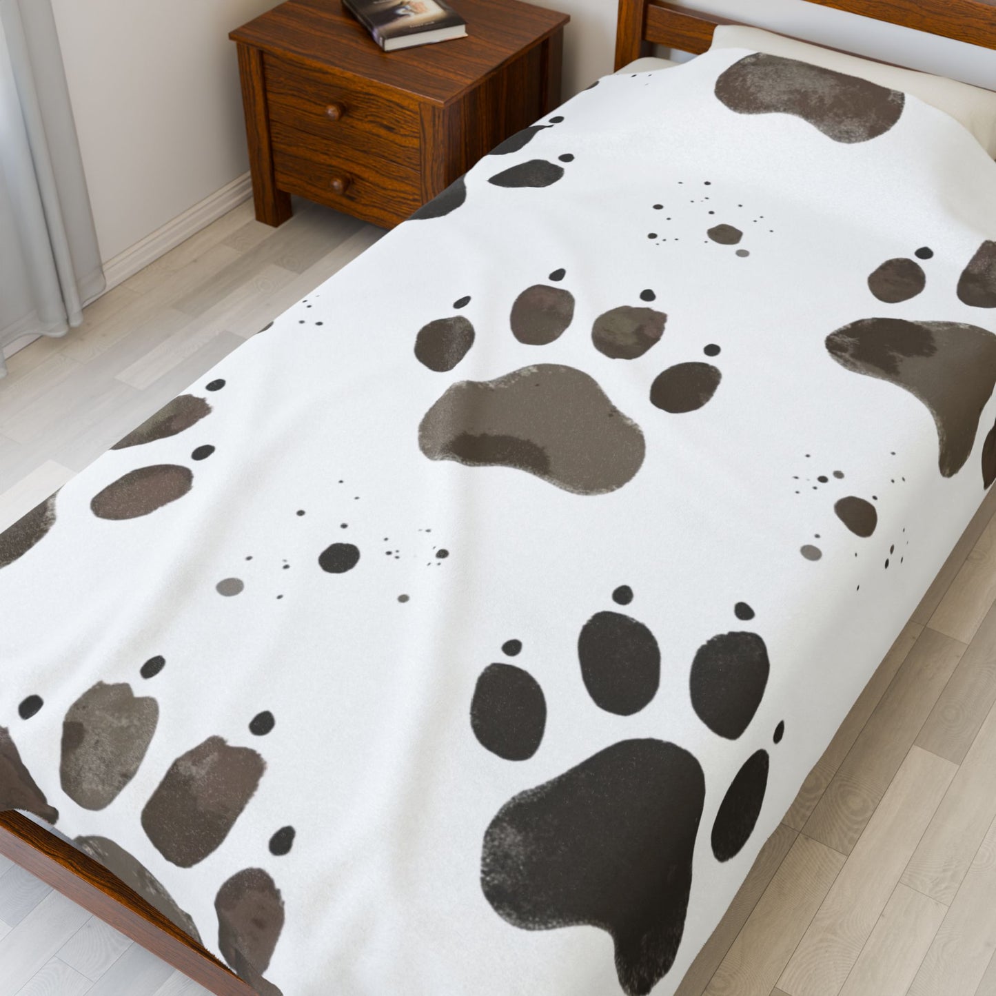 Plush Pet Paw Blanket, perfect for cozy nights in or lazy afternoons on the sofa. The vibrant print adds a playful touch to any room, making it an ideal addition to your home decor.