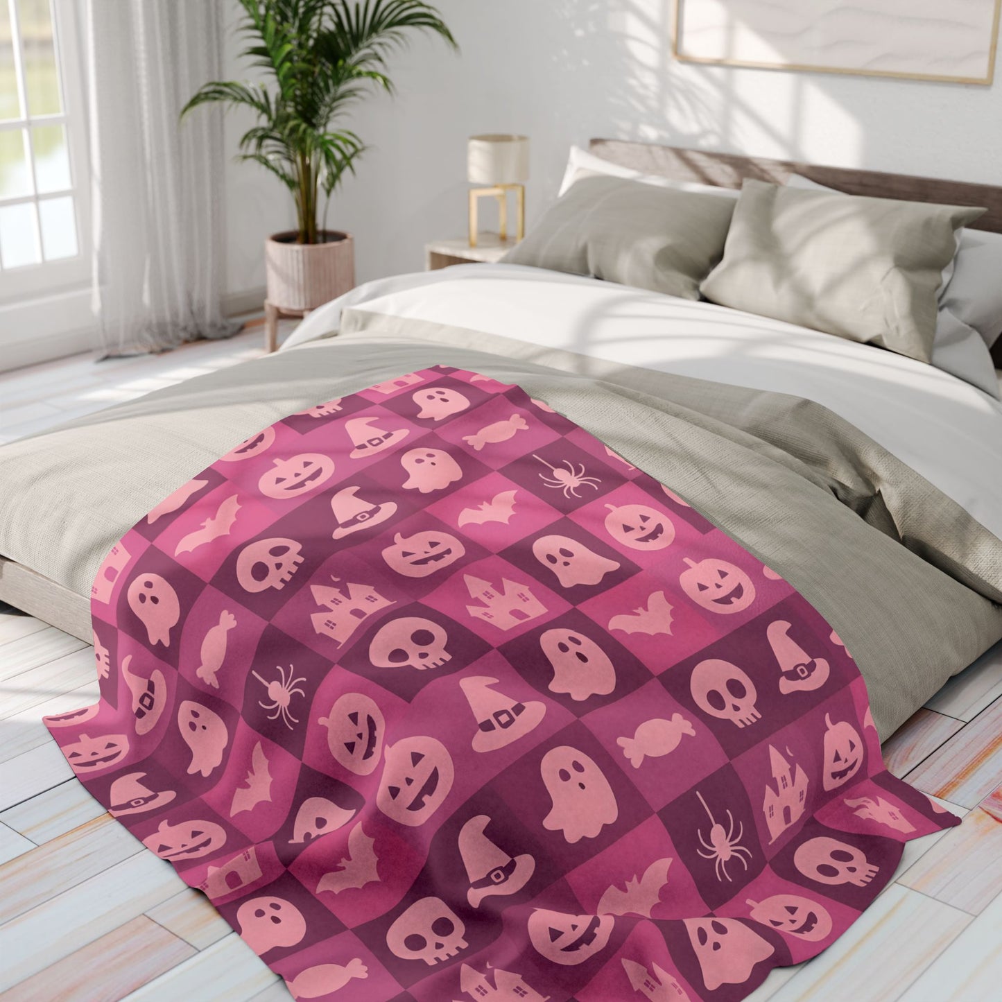 Spooky Pink Halloween Blanket, perfect for adding a unique twist to your seasonal decor. Drape this plush pink ghost blanket over your sofa to invite a cozy, festive warmth