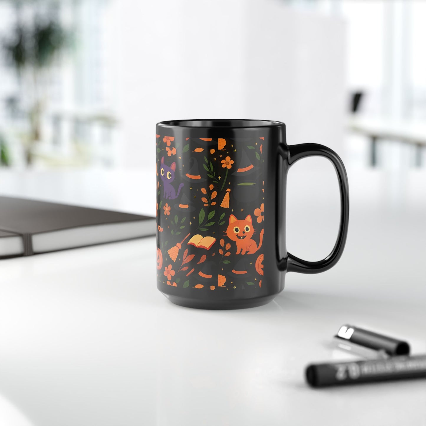 Colourful cat Halloween mug,featuring a cheeky cat with all things Halloween, making it the perfect spooky mug for both hot chocolates and enchanting brews. 