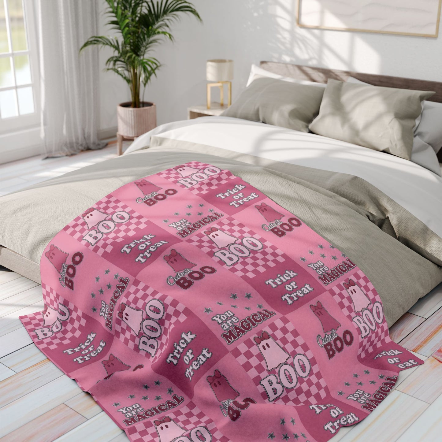 Cutest Boo Pink Ghost Blanket, This soft and fluffy throw features charming ghosties dancing across a playful pink canvas, making it the perfect snuggle blanket for cozy nights in.
