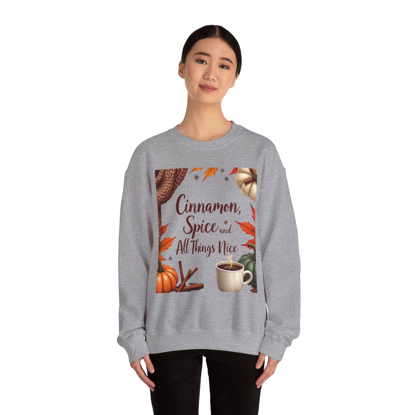 Cinnamon Spice and All Things Nice Sweatshirt, promises to keep you snug while adding a touch of seasonal charm to your wardrobe. Whether you’re sipping on a pumpkin latte or taking a leisurely stroll through fallen leaves,