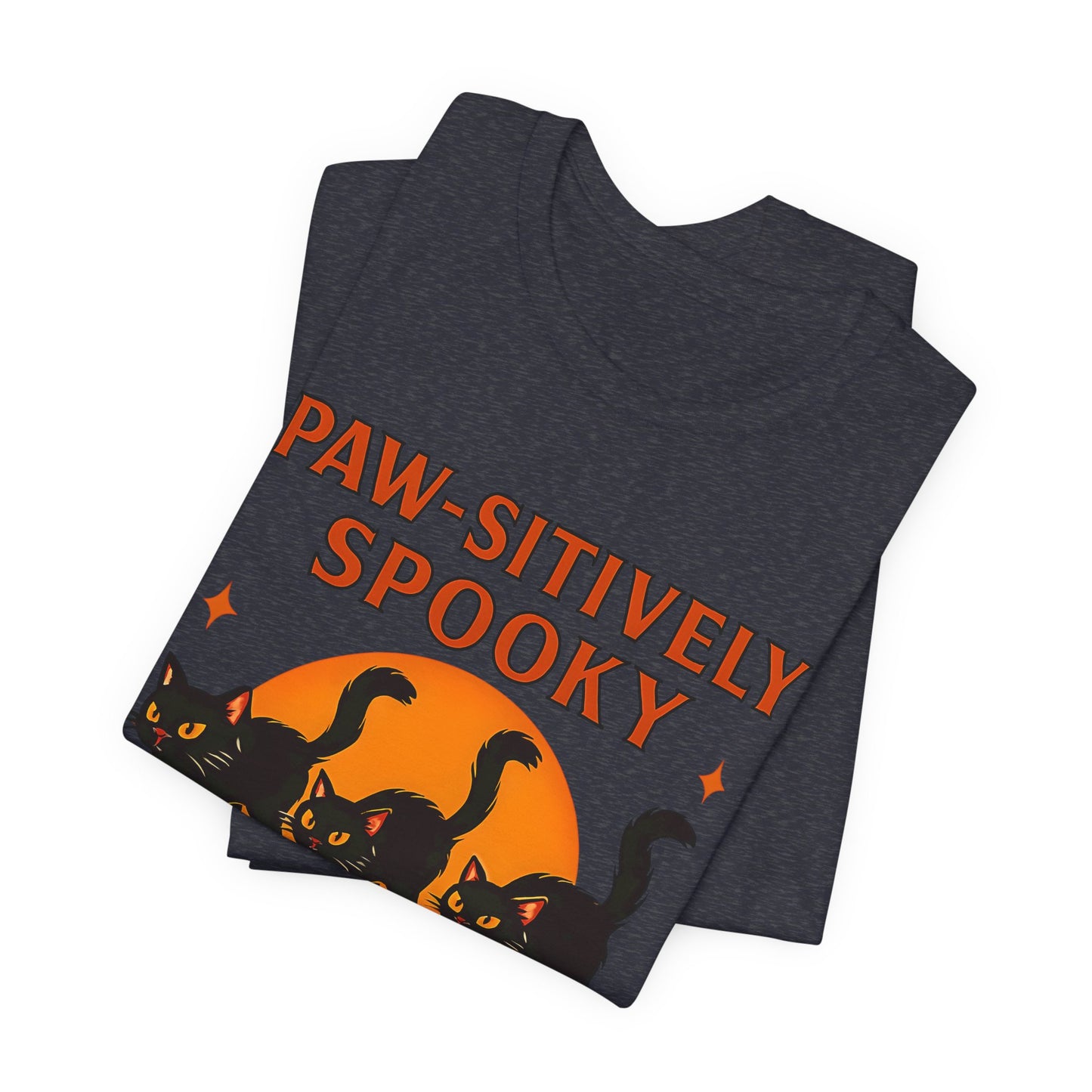Paw-sitively Spooky Cat Tshirt, Whether you're a devoted cat dad or gifting it to a feline-loving friend, this cute Halloween cat apparel spreads pawsitive vibes with its blend of spooky black cats and cheeky charm.