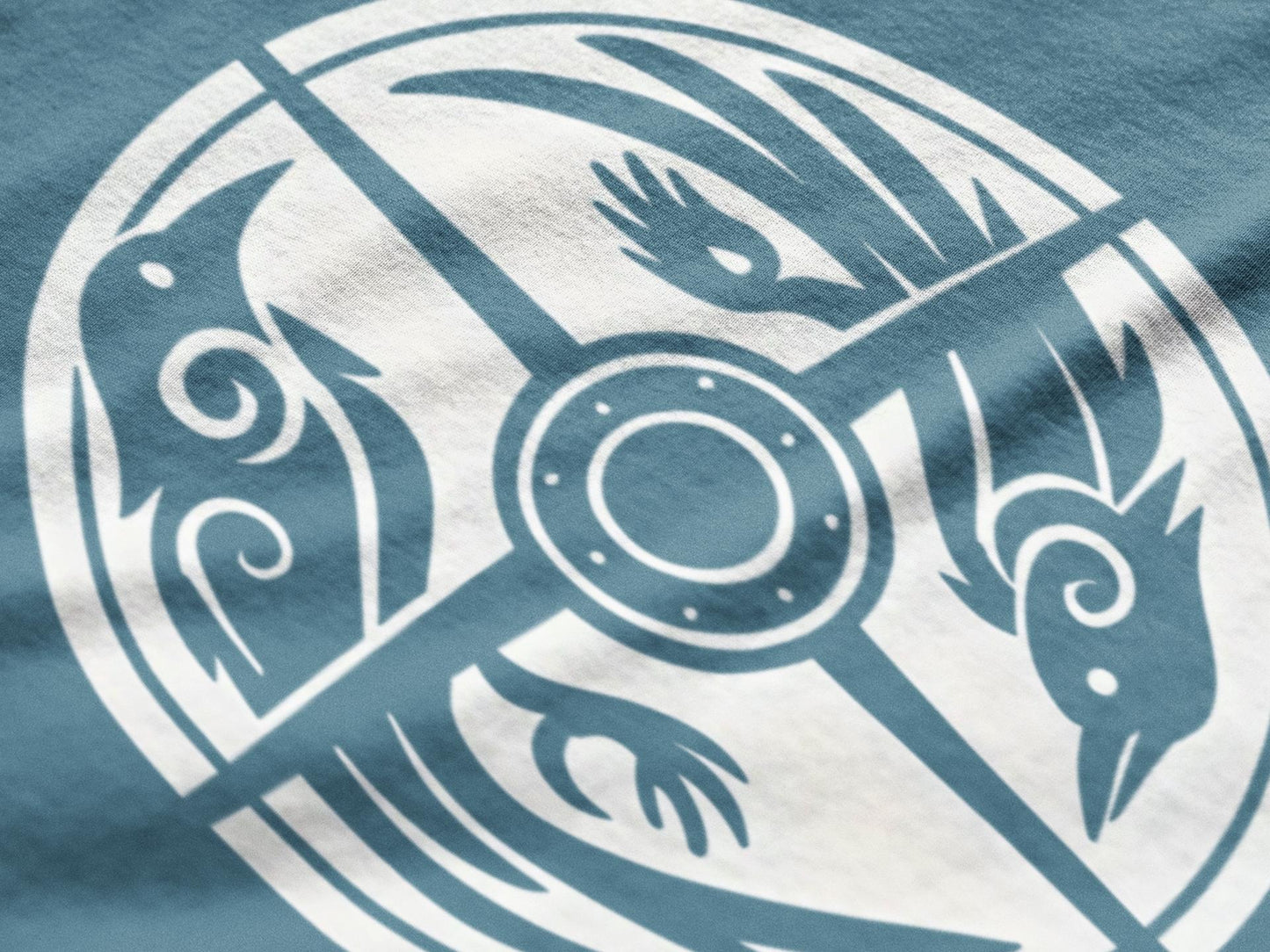 Norse Raven Shield T-shirt, Embrace the spirit of ancient warriors, an essential piece for any lover of Viking apparel.
