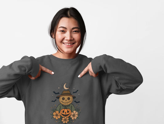 Cozy Halloween Sweatshirt with Scarecrow Design, The playful design featuring a whimsical scarecrow and autumnal elements creates a cheerful vibe, perfect for adding a festive touch to your wardrobe.