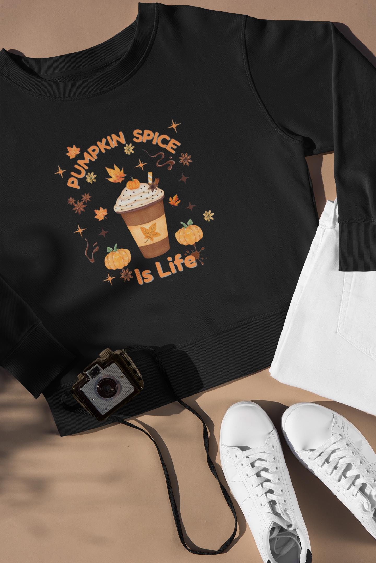 Pumpkin Spice is Life Sweatshirt, This autumn jumper is designed to wrap you in the warmth and comfort that the pumpkin spice season brings.