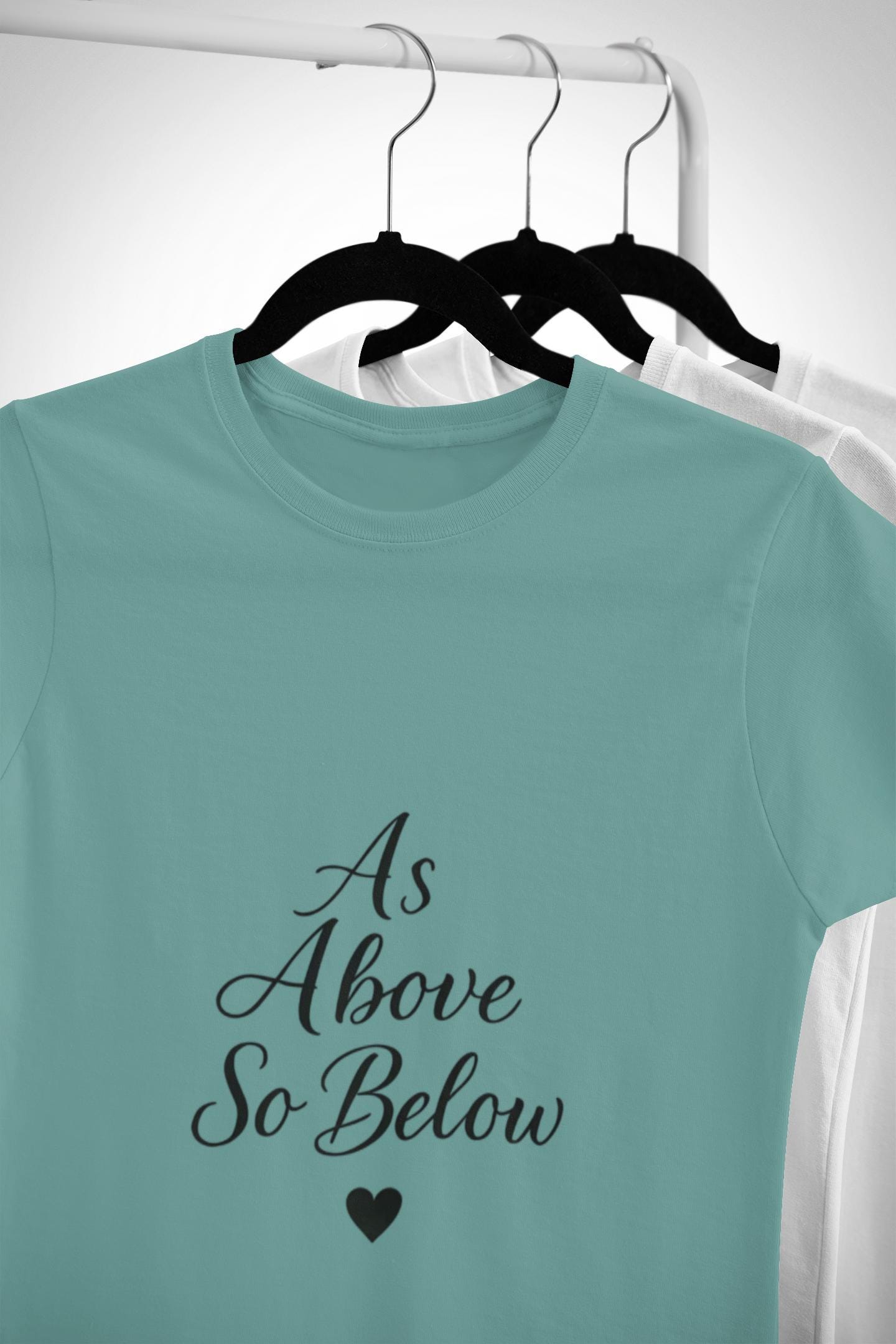 As Above So Below T-shirt, Embrace the celestial vibes infused in this spiritual tee, where the ancient secrets of pagan clothing meet the modern allure of witchy clothes.