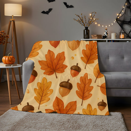 Autumnal Leaf Blanket Throw, This soft cozy blanket, adorned with intricate oak leaf acorn patterns, seamlessly captures the essence of the autumn eason