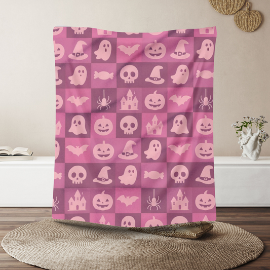 Spooky Pink Halloween Blanket, perfect for adding a unique twist to your seasonal decor. Drape this plush pink ghost blanket over your sofa to invite a cozy, festive warmth