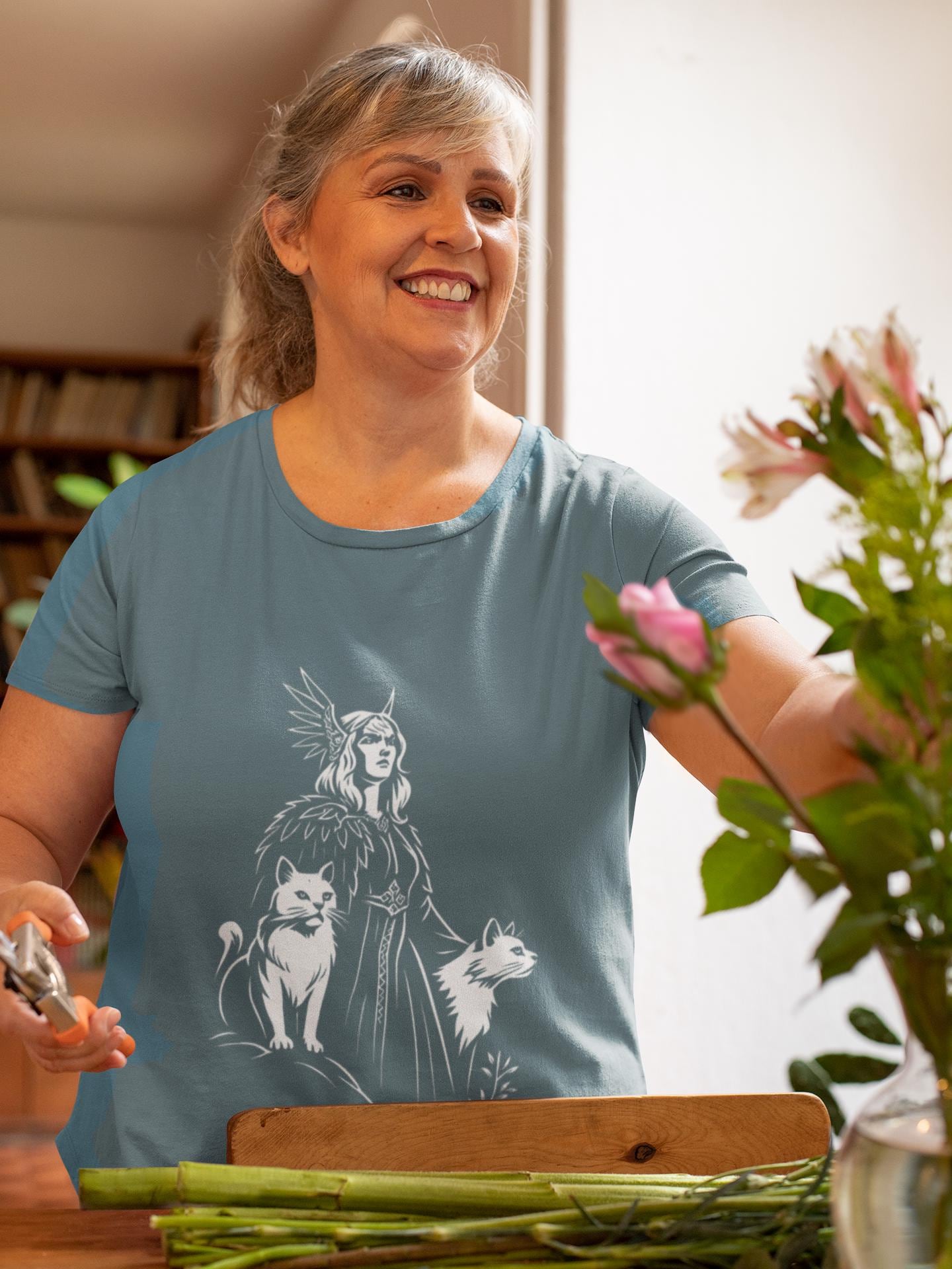 Freyja Viking Goddess T-Shirt, This captivating viking tee encapsulates the essence of Freya—the viking goddess renowned for her formidable power and grace.