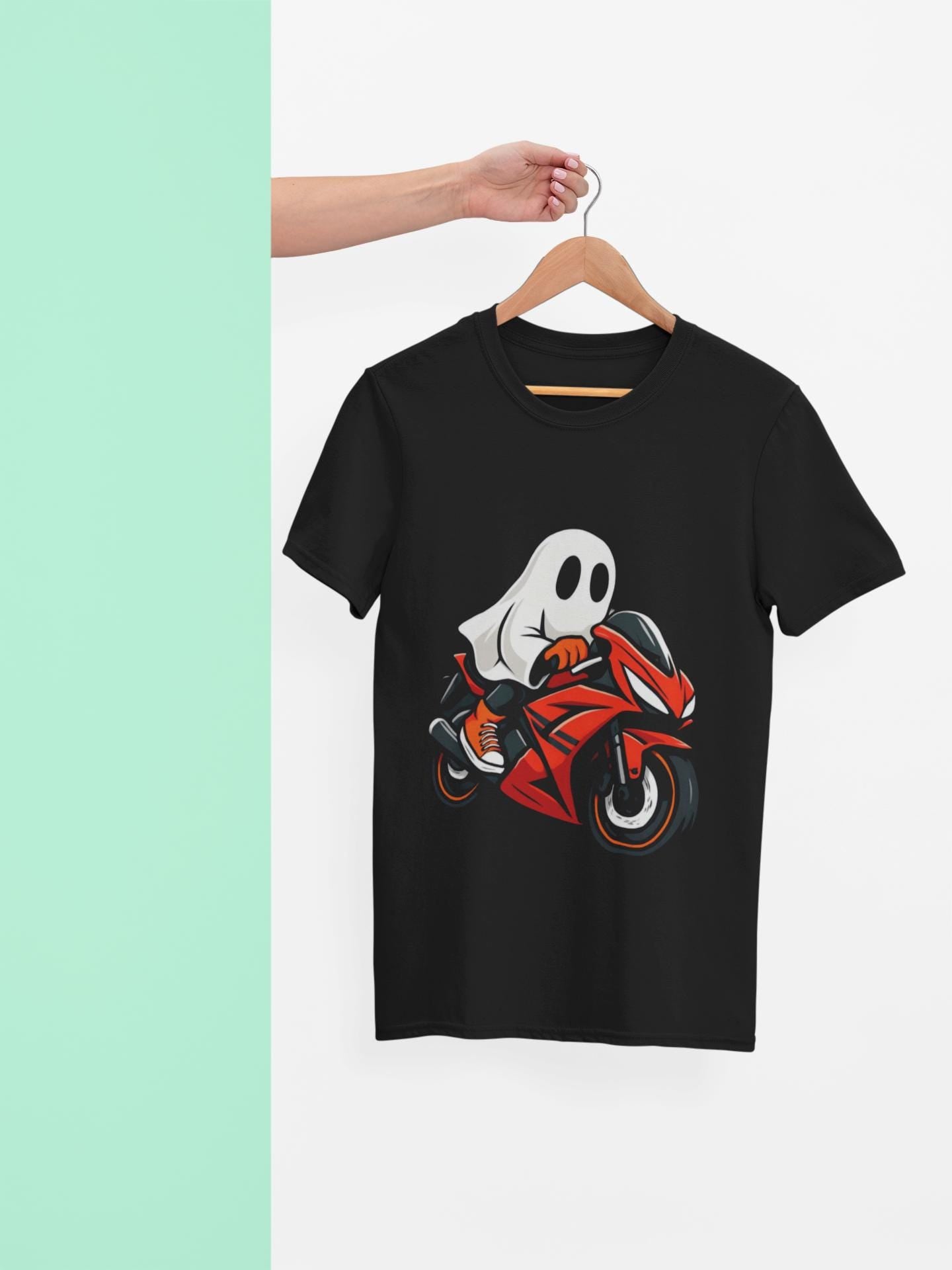 Ghosty Biker T-shirt, This ghost rider shirt captures the essence of Halloween with its hauntingly cool design, making it an essential piece for motorcycle enthusiasts who crave a dose of the supernatural.