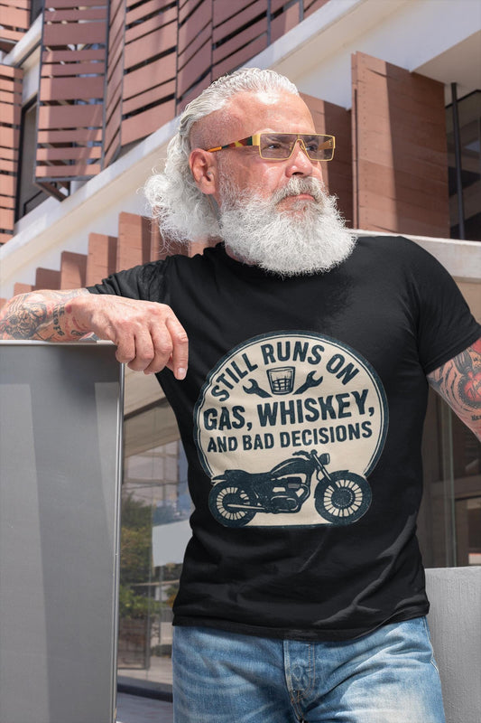 Still Runs On Gas Whiskey And Bad Decisions Shirt, This motorcycle tee blends humor with style, making it an essential addition to any biker's wardrobe.