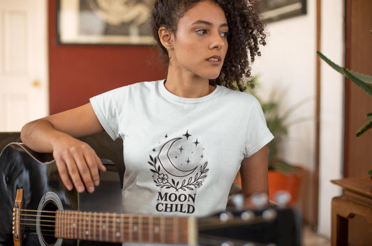 Moon Child T-Shirt, Crescent Moon Shirt, this moon child tee is more than just a piece of pagan clothing—it's a magical shirt that invites the wearer to explore the enchanting world of witchy things.