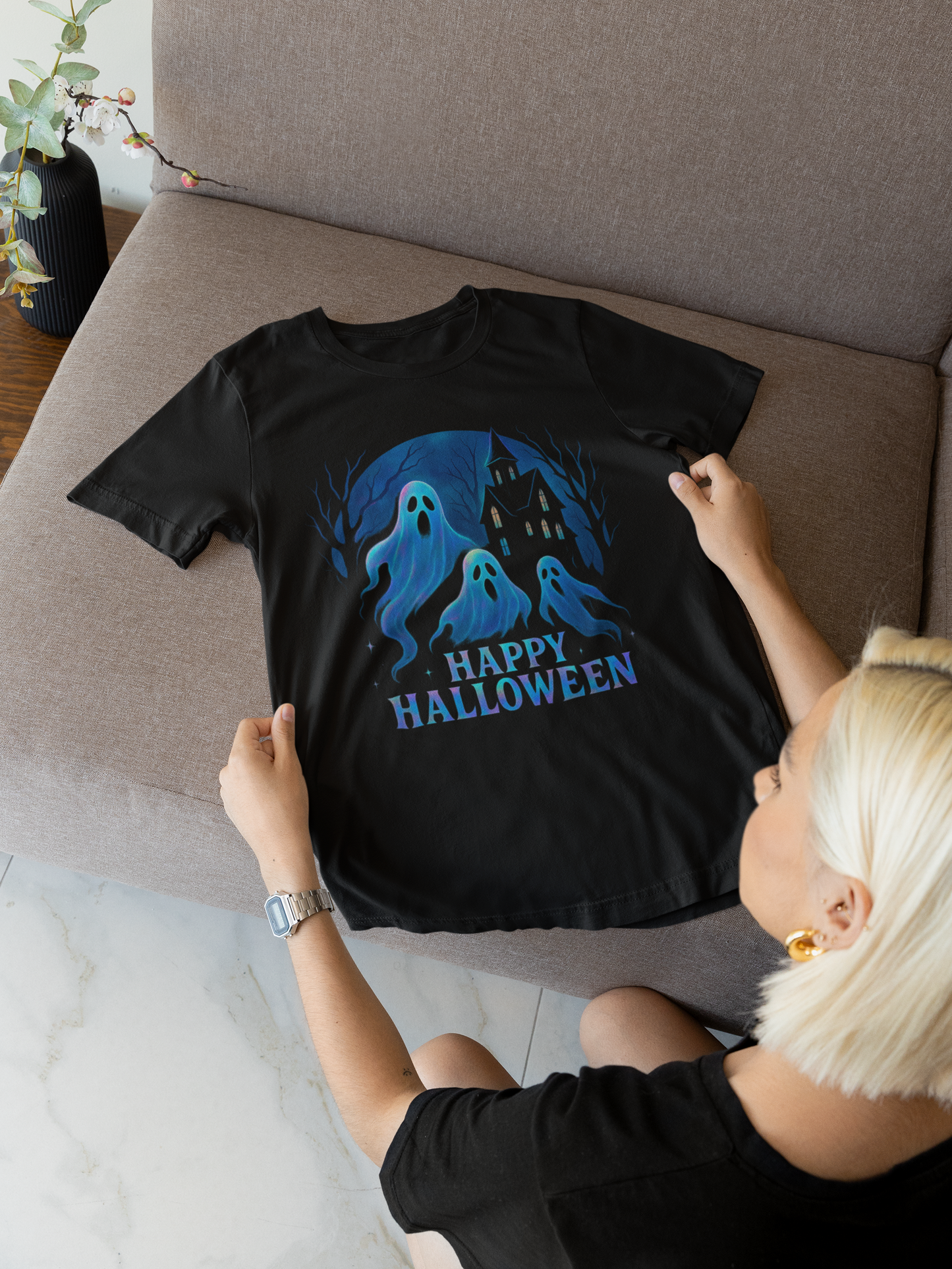 Happy Halloween Holographic Ghost Tshirt,this ghostie-themed top is both a haunted shirt and a whimsical addition for any fan of ghostly fun.