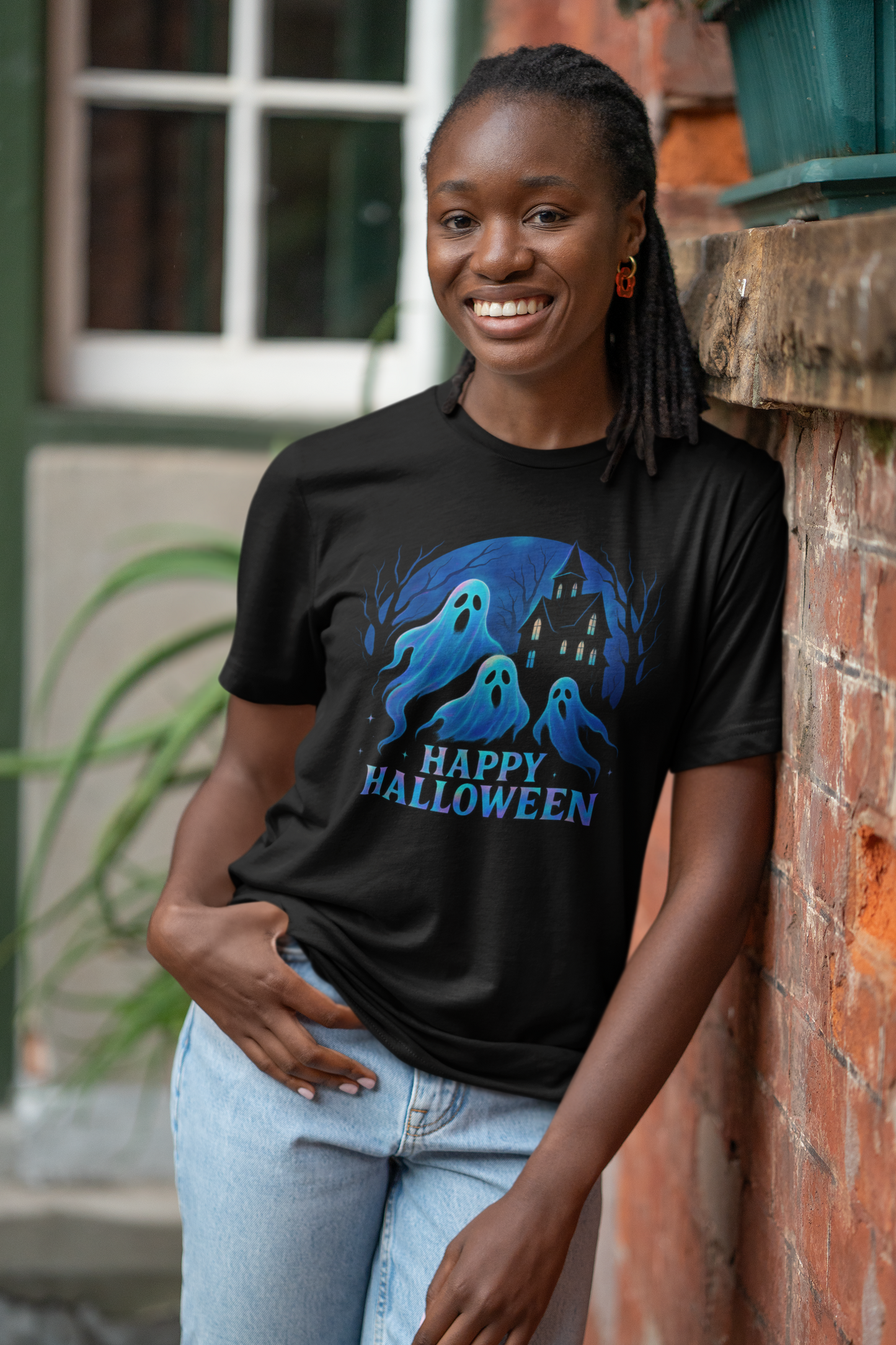 Happy Halloween Holographic Ghost Tshirt,this ghostie-themed top is both a haunted shirt and a whimsical addition for any fan of ghostly fun.