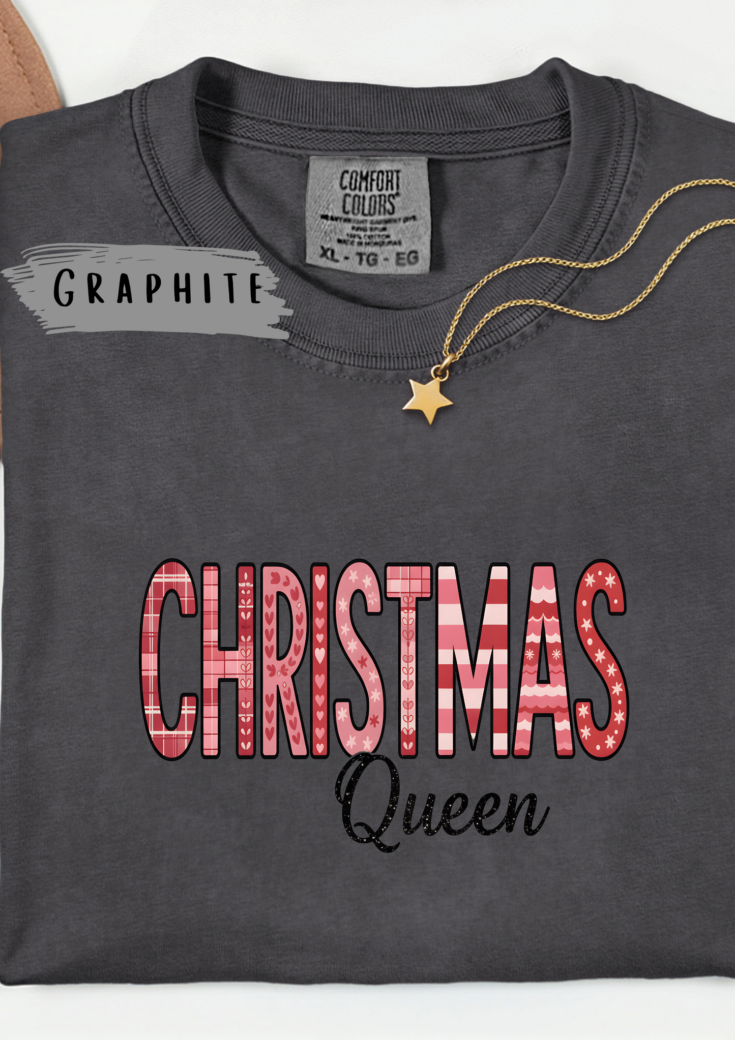 Christmas Queen Pinkmas T-shirt,this pink Christmas tee offers unparalleled comfort, making it a fabulous holiday graphic tee for all your festive activities.